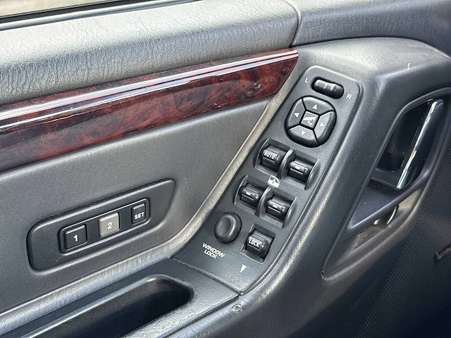 Jeep grand cherokee 4.7i v8 limited | 48-ft-ln - afbeelding 15 van  29