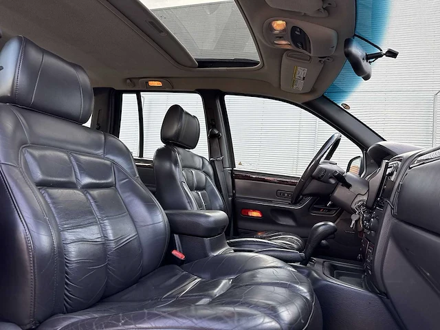 Jeep grand cherokee 4.7i v8 limited | 48-ft-ln - afbeelding 18 van  29