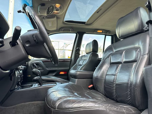 Jeep grand cherokee 4.7i v8 limited | 48-ft-ln - afbeelding 23 van  29