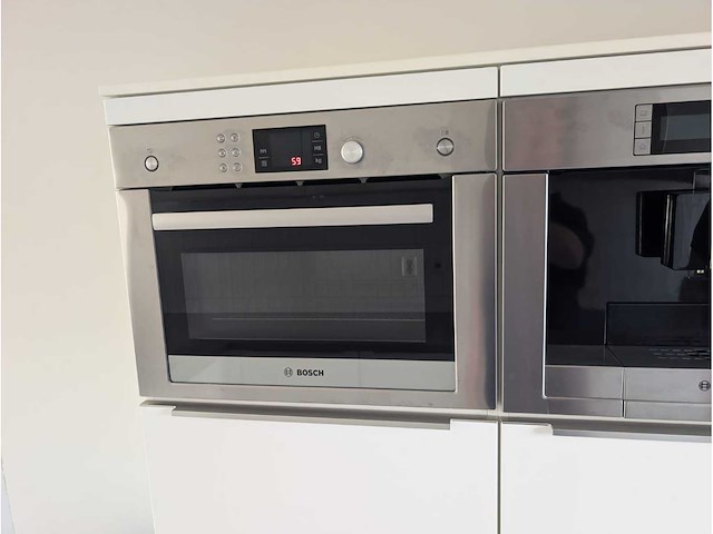Keuken met bosch apparatuur en novy fornuis - afbeelding 16 van  39