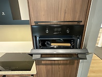 Keuken met inbouwapparatuur, nobilia, riva, noten milano - afbeelding 16 van  17