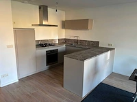 Keuken met whirlpool apparatuur