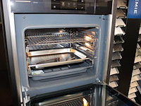 Keuken nolte neo in hoekopstelling en werkeiland met inbouwapparatuur - afbeelding 6 van  9