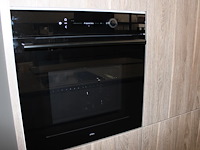 Keuken opstelling nolte met wand en eiland en inbouwapparatuur - afbeelding 7 van  12