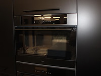 Keuken opstelling nolte met wand en eiland en luxe inbouwapparatuur - afbeelding 11 van  13