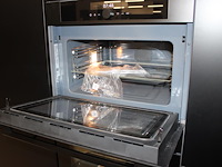 Keuken opstelling nolte met wand en eiland en luxe inbouwapparatuur - afbeelding 12 van  13