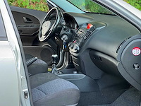 Kia - 2009 - cee'd sporty wagon - 1.4 fifteen isg - personenauto - 08-jkx-1 - afbeelding 10 van  17
