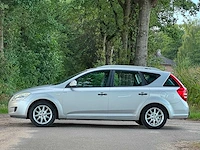 Kia - 2009 - cee'd sporty wagon - 1.4 fifteen isg - personenauto - 08-jkx-1 - afbeelding 15 van  17