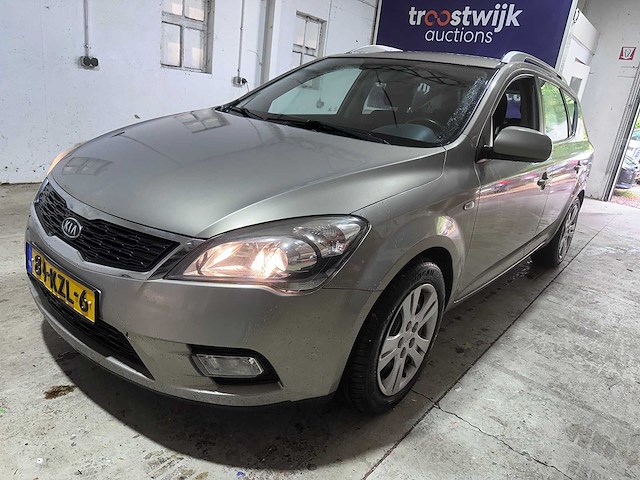 Kia - cee'd sporty wagon - 1.4 cvvt x-ecutive - 84-kzl-6- 2010 - afbeelding 1 van  18