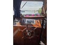 Klassieke stalen motorboot met flybridge en compleet interieur - afbeelding 4 van  18