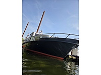 Klassieke stalen motorboot met flybridge en compleet interieur - afbeelding 15 van  18