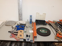 Klusproducten w.o. waterpassen, doorslijpschijven en rij. - afbeelding 1 van  3