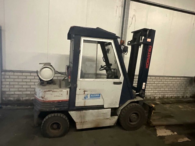 Komatsu - 1990 - fg25t - vorkheftruck 2,5t - afbeelding 1 van  17