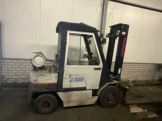 Komatsu - 1990 - fg25t - vorkheftrucks - afbeelding 1 van  17