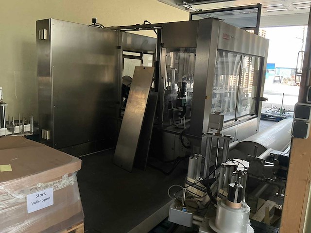 Krones/stork/zalkin/kosme flessen spoel/vul/etiketteerlijn (7000 fles/uur)met onderdelen - afbeelding 34 van  99