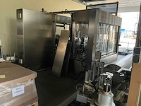 Krones/stork/zalkin/kosme flessen spoel/vul/etiketteerlijn (7000 fles/uur)met onderdelen - afbeelding 34 van  99