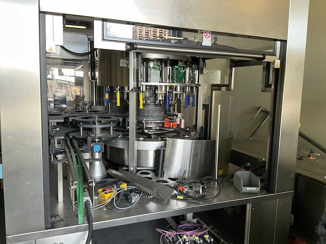 Krones/stork/zalkin/kosme flessen spoel/vul/etiketteerlijn (7000 fles/uur)met onderdelen - afbeelding 94 van  99