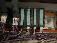 Krones/stork/zalkin/kosme flessen spoel/vul/etiketteerlijn (7000 fles/uur)met onderdelen - afbeelding 98 van  99