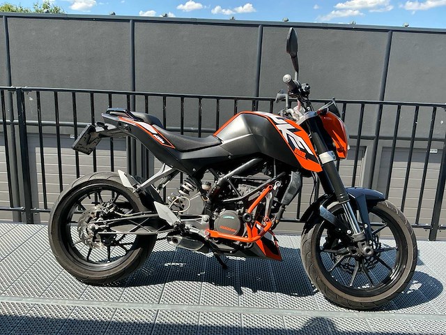 Ktm tour 125 duke motorfiets - afbeelding 12 van  29