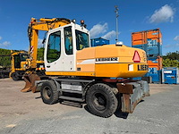 Liebher a 316 mobiele bandengraafmachine met rotortilt - afbeelding 9 van  15