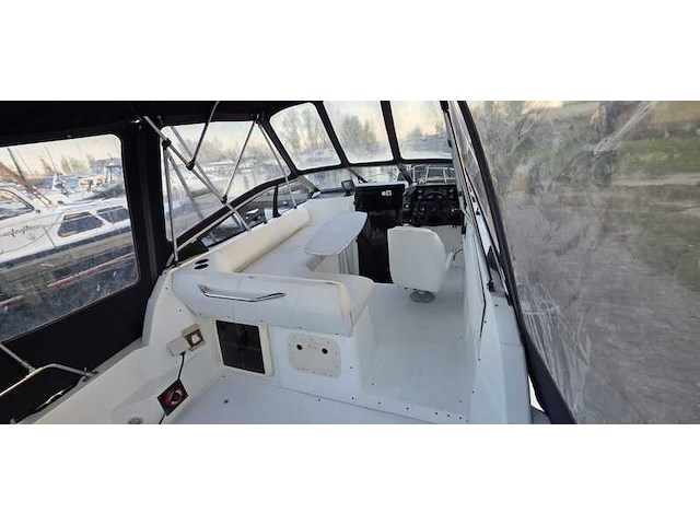 (locatie biddinghuizen) kajuitboot, bayliner, 2655, wit, 1992, met mercruiser motor - afbeelding 2 van  30