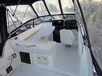 (locatie biddinghuizen) kajuitboot, bayliner, 2655, wit, 1992, met mercruiser motor - afbeelding 2 van  30