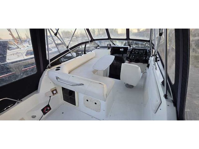 (locatie biddinghuizen) kajuitboot, bayliner, 2655, wit, 1992, met mercruiser motor - afbeelding 3 van  30