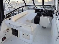 (locatie biddinghuizen) kajuitboot, bayliner, 2655, wit, 1992, met mercruiser motor - afbeelding 3 van  30