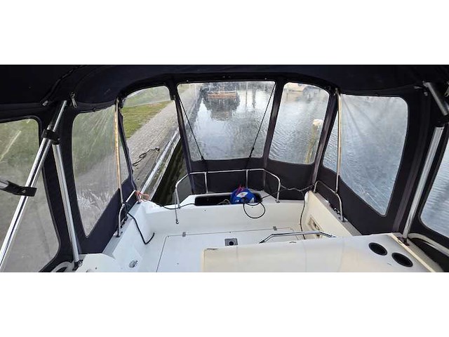 (locatie biddinghuizen) kajuitboot, bayliner, 2655, wit, 1992, met mercruiser motor - afbeelding 5 van  30