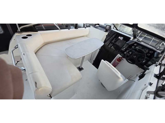 (locatie biddinghuizen) kajuitboot, bayliner, 2655, wit, 1992, met mercruiser motor - afbeelding 6 van  30