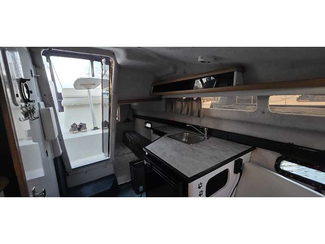 (locatie biddinghuizen) kajuitboot, bayliner, 2655, wit, 1992, met mercruiser motor - afbeelding 10 van  30