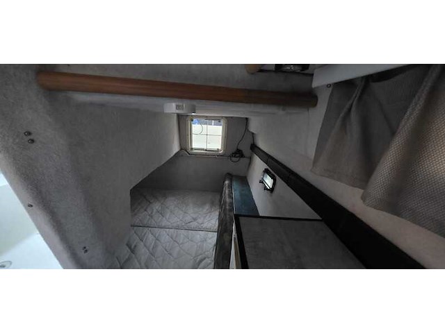 (locatie biddinghuizen) kajuitboot, bayliner, 2655, wit, 1992, met mercruiser motor - afbeelding 11 van  30