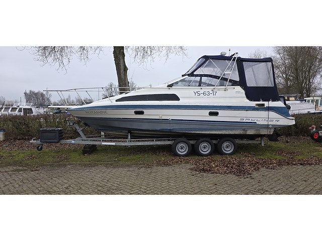 (locatie biddinghuizen) kajuitboot, bayliner, 2655, wit, 1992, met mercruiser motor - afbeelding 1 van  30