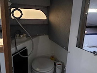 (locatie biddinghuizen) kajuitboot, bayliner, 2655, wit, 1992, met mercruiser motor - afbeelding 13 van  30