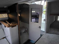 (locatie biddinghuizen) kajuitboot, bayliner, 2655, wit, 1992, met mercruiser motor - afbeelding 14 van  30