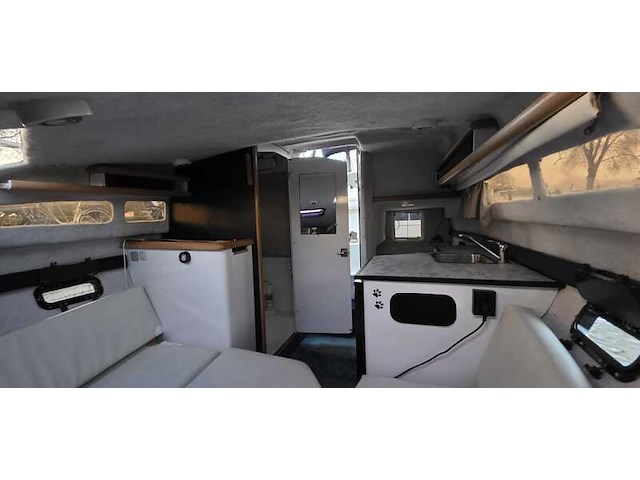 (locatie biddinghuizen) kajuitboot, bayliner, 2655, wit, 1992, met mercruiser motor - afbeelding 15 van  30