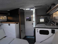 (locatie biddinghuizen) kajuitboot, bayliner, 2655, wit, 1992, met mercruiser motor - afbeelding 15 van  30