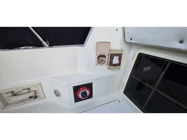 (locatie biddinghuizen) kajuitboot, bayliner, 2655, wit, 1992, met mercruiser motor - afbeelding 21 van  30