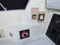 (locatie biddinghuizen) kajuitboot, bayliner, 2655, wit, 1992, met mercruiser motor - afbeelding 21 van  30