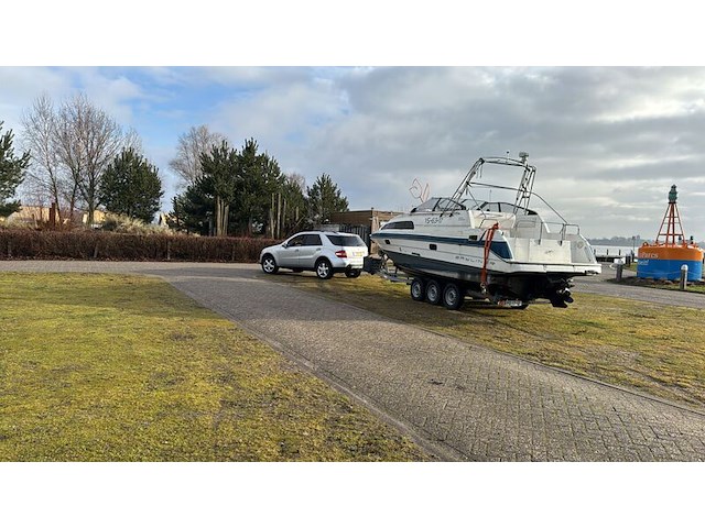 (locatie biddinghuizen) kajuitboot, bayliner, 2655, wit, 1992, met mercruiser motor - afbeelding 26 van  30