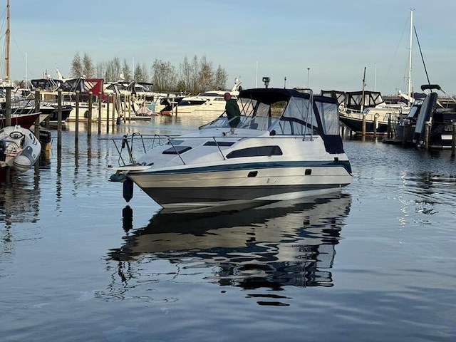 (locatie biddinghuizen) kajuitboot, bayliner, 2655, wit, 1992, met mercruiser motor - afbeelding 28 van  30