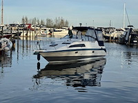 (locatie biddinghuizen) kajuitboot, bayliner, 2655, wit, 1992, met mercruiser motor - afbeelding 28 van  30