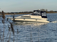 (locatie biddinghuizen) kajuitboot, bayliner, 2655, wit, 1992, met mercruiser motor - afbeelding 29 van  30