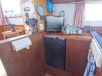 (locatie biddinghuizen) motorjacht, lauwersmeer, kruiser 1130, wit, 1982 - afbeelding 4 van  25