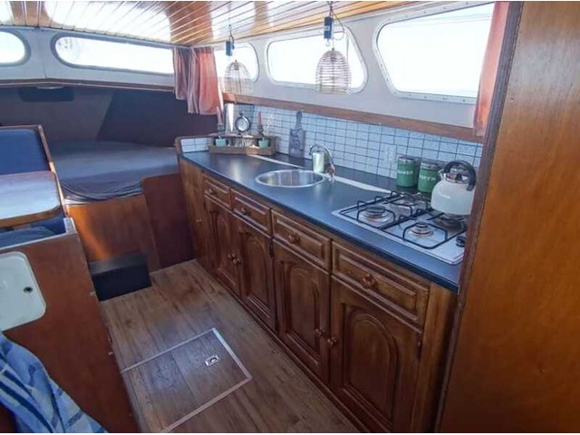 (locatie biddinghuizen) motorjacht, lauwersmeer, kruiser 1130, wit, 1982 - afbeelding 5 van  25