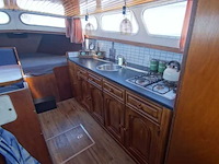 (locatie biddinghuizen) motorjacht, lauwersmeer, kruiser 1130, wit, 1982 - afbeelding 5 van  25