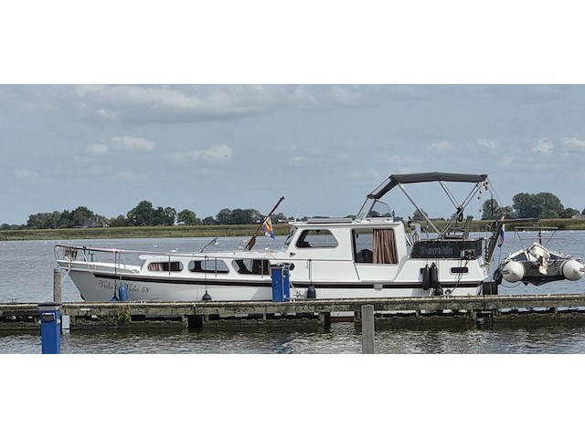(locatie biddinghuizen) motorjacht, lauwersmeer, kruiser 1130, wit, 1982 - afbeelding 10 van  25