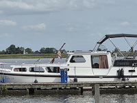 (locatie biddinghuizen) motorjacht, lauwersmeer, kruiser 1130, wit, 1982 - afbeelding 10 van  25