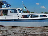 (locatie biddinghuizen) motorjacht, lauwersmeer, kruiser 1130, wit, 1982