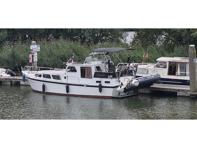 (locatie biddinghuizen) motorjacht, lauwersmeer, kruiser 1130, wit, 1982 - afbeelding 12 van  25